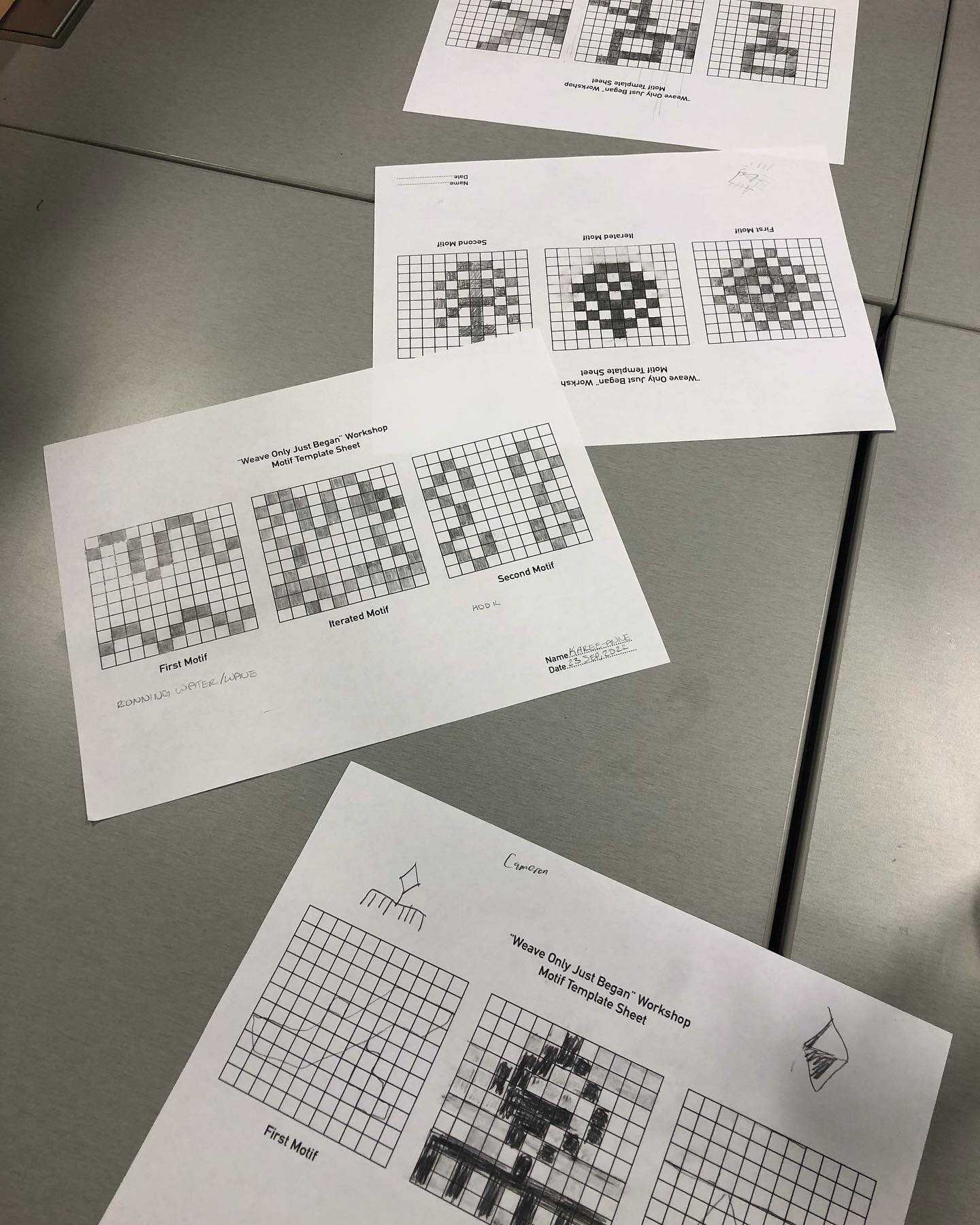 Printed grids with blocks filled in to form patterns